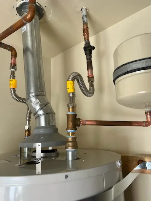Water heater installation and plumbing repair in The Gables